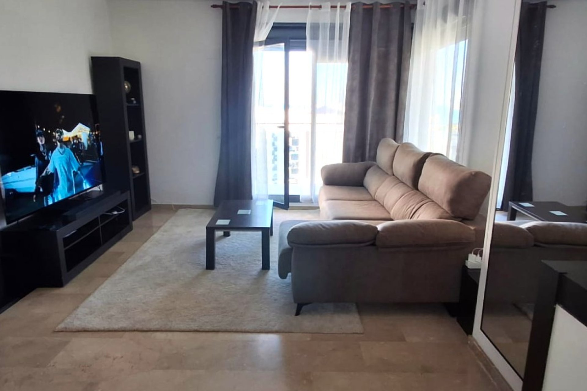 Living room - Mediterranean-Style Penthouse — Renovated, Bright, and with Sea Views Just 4 Minutes from La Cala Beach