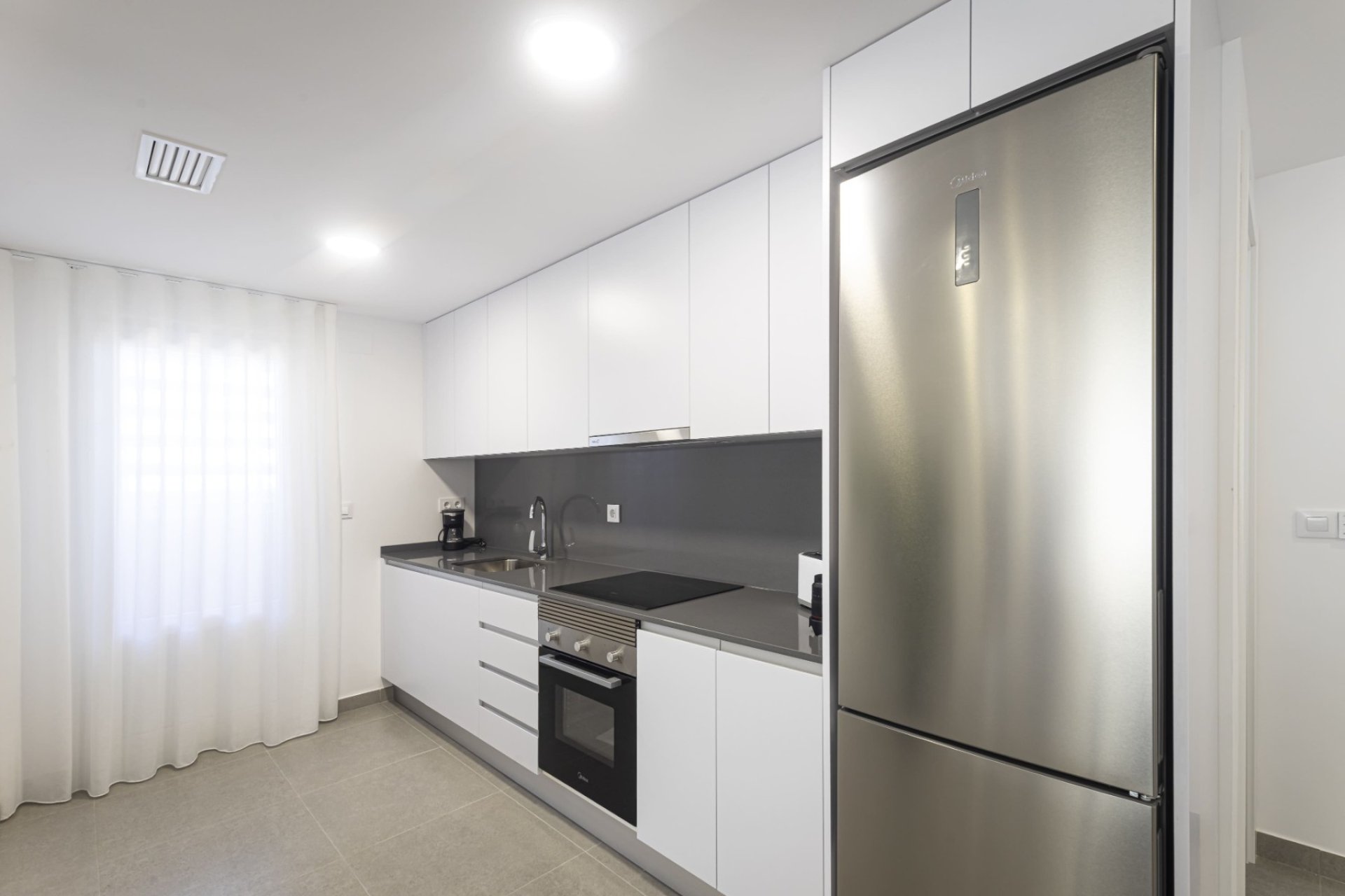 Neue Gebäude - Duplex -
